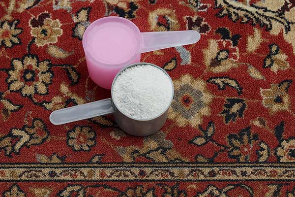 Poudre nettoyant pour nettoyer à sec un tapis