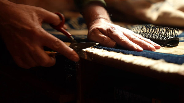 Réparation franges tapis