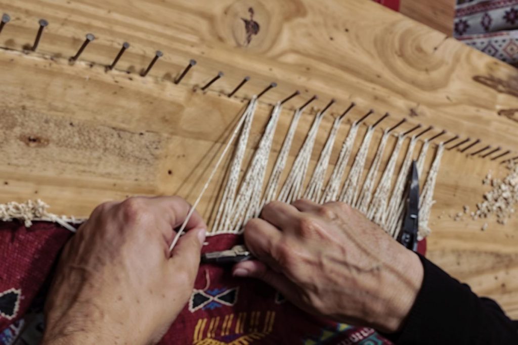 Réparation franges tapis