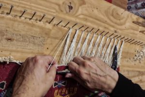 Réparation franges tapis