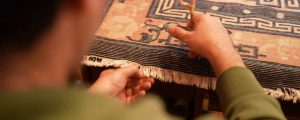 Restauration bordure tapis persan ancien