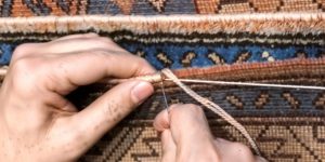 Restauration d’une bordure de tapis