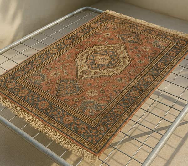 Séchage à plat et à l’air libre d'un tapis